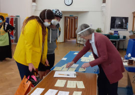Neighbours in Poplar preparing to distribute hot meals