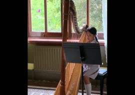 Student playing the harp at Genazzano FCJ College