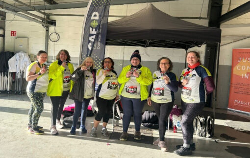 Runners with their medals