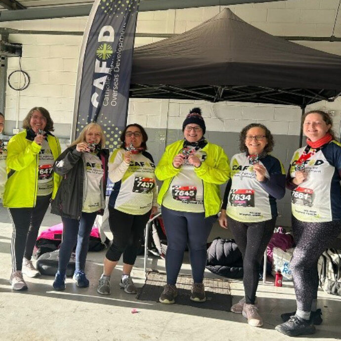 Runners with their medals
