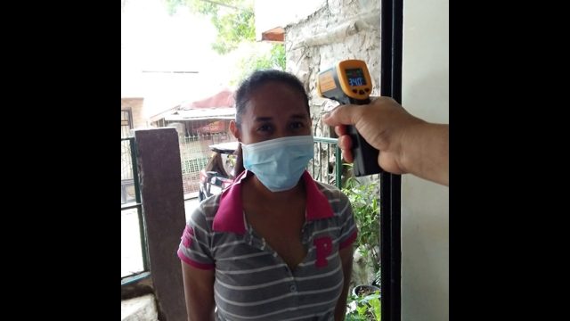 Taking temperature of visitors Taking temperature of visitors